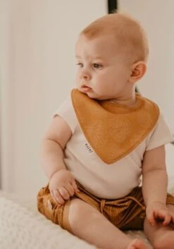 MAÉMÉ Bavoir Feuilles Ocre